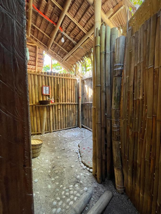 Tribal Huts Community Hostel Daanbantayan Ruang foto