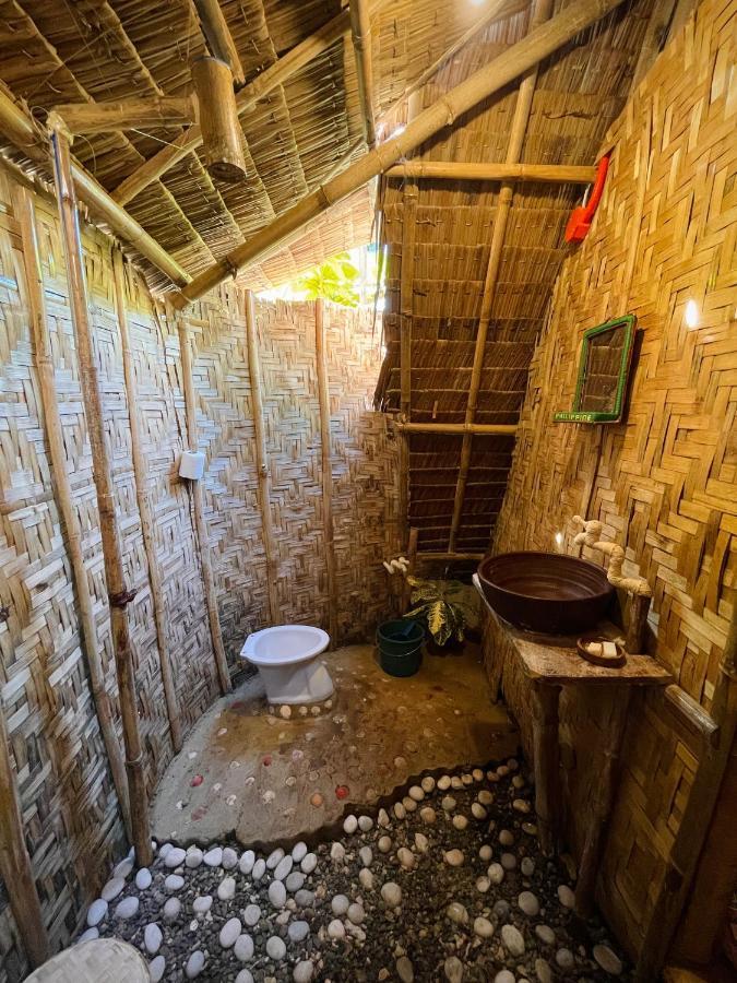 Tribal Huts Community Hostel Daanbantayan Bagian luar foto