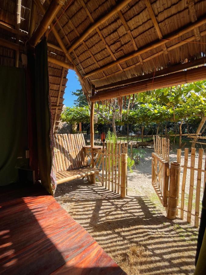 Tribal Huts Community Hostel Daanbantayan Bagian luar foto