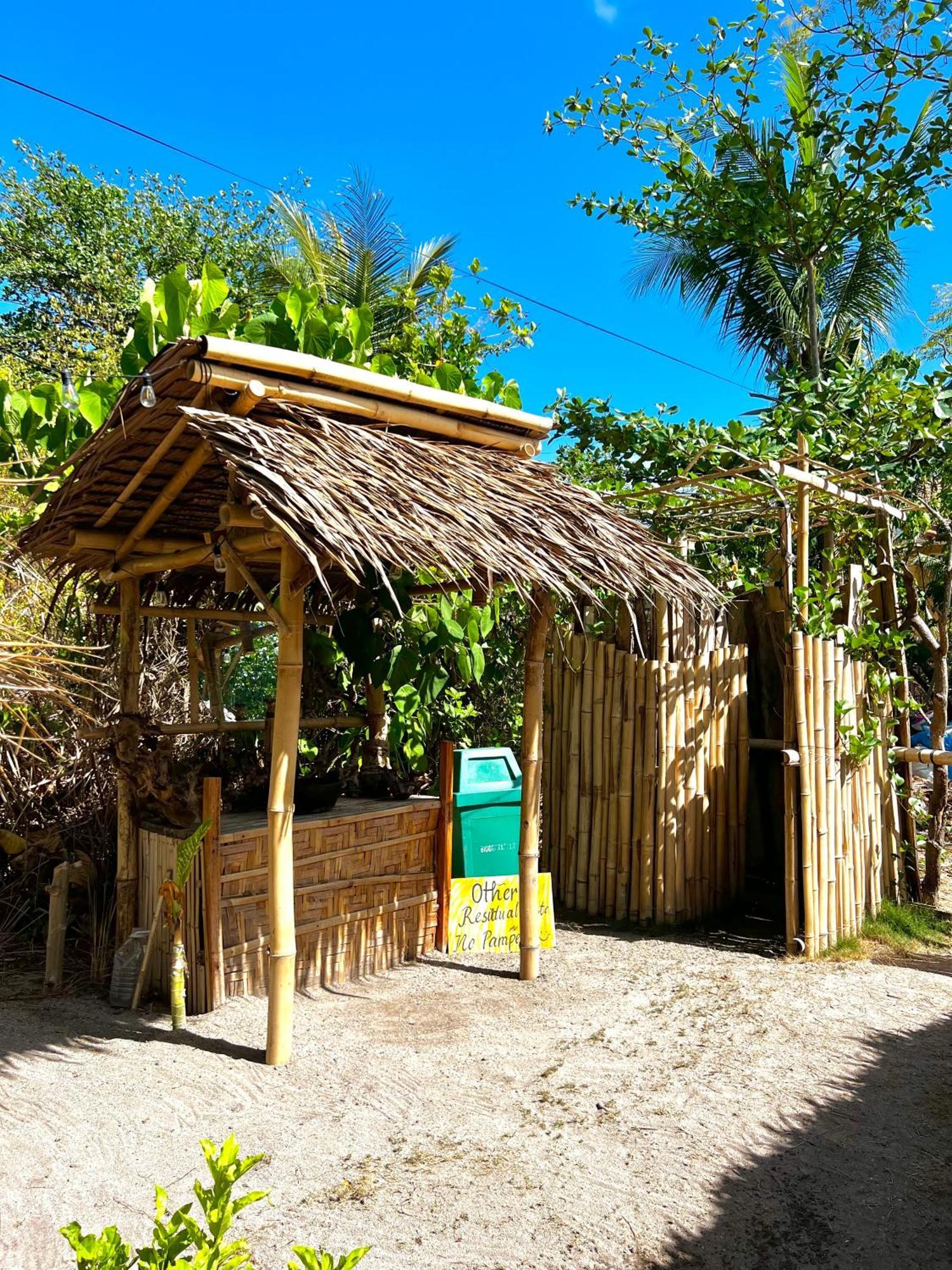 Tribal Huts Community Hostel Daanbantayan Bagian luar foto