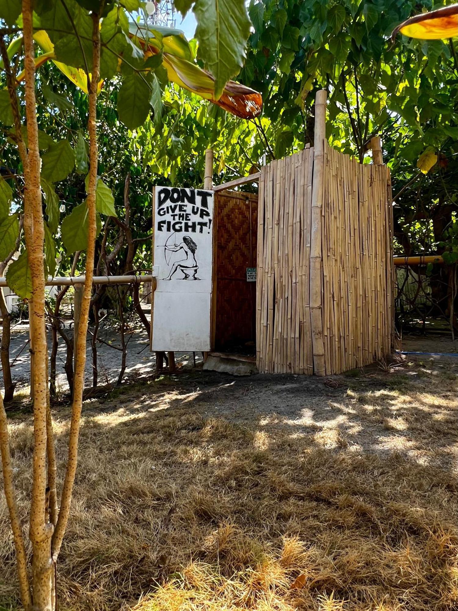 Tribal Huts Community Hostel Daanbantayan Bagian luar foto