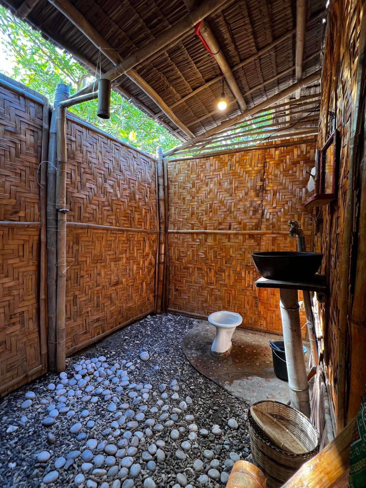 Tribal Huts Community Hostel Daanbantayan Ruang foto