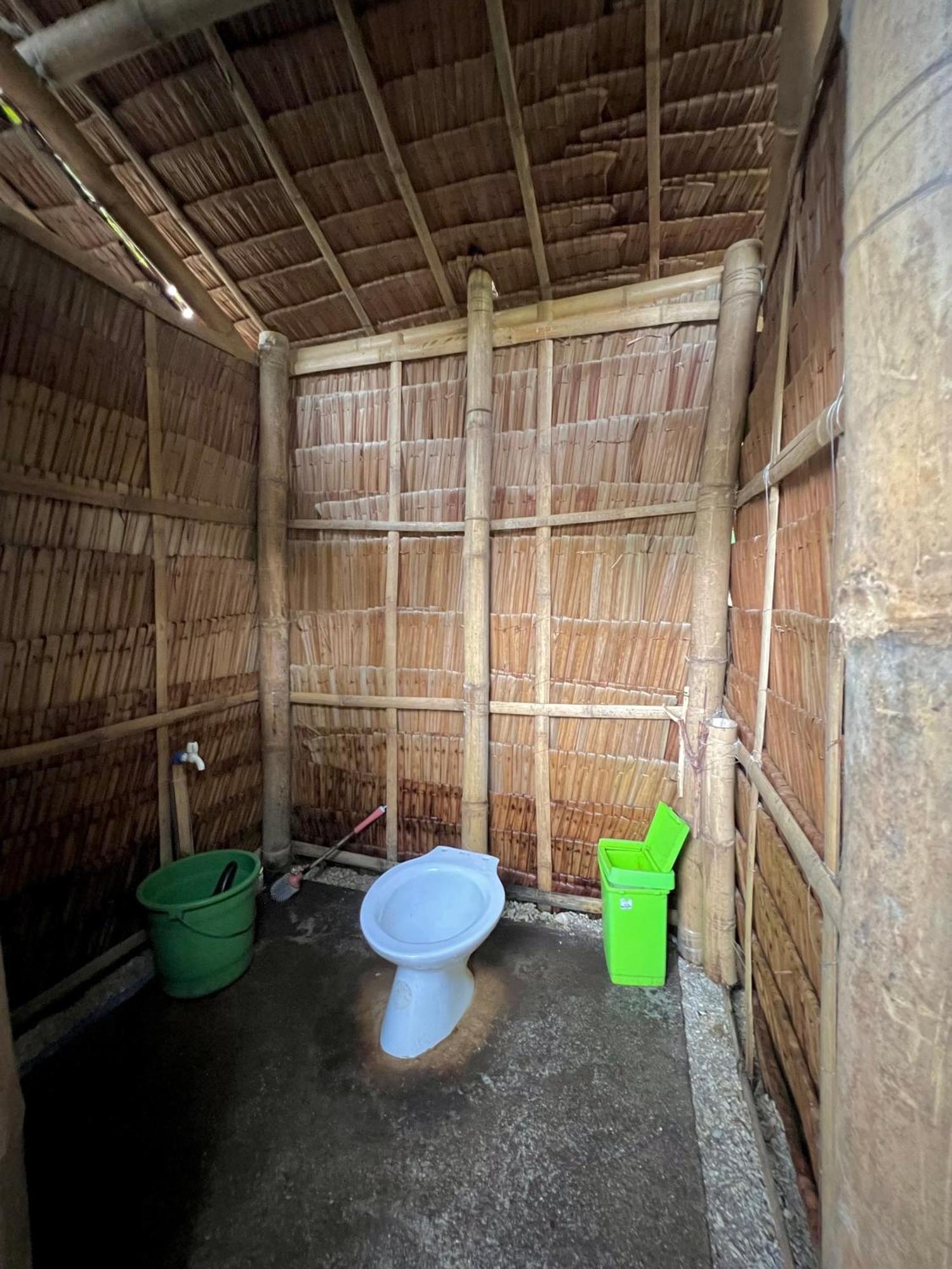 Tribal Huts Community Hostel Daanbantayan Ruang foto