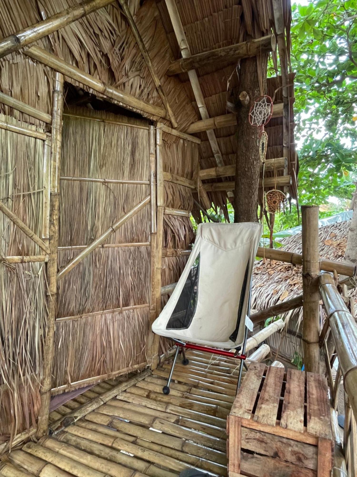 Tribal Huts Community Hostel Daanbantayan Ruang foto